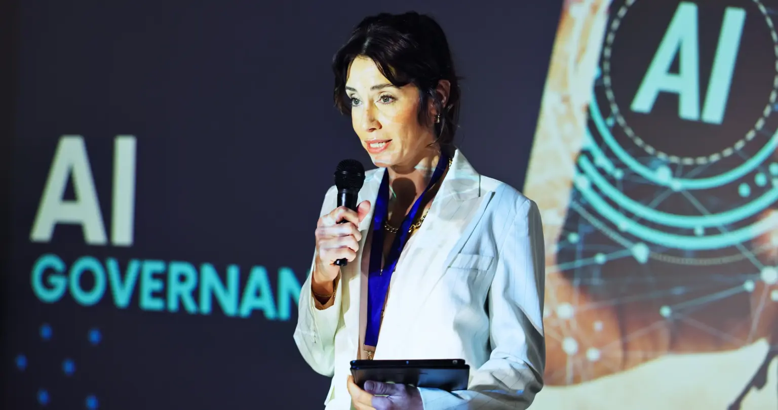 woman speaking about AI Governance